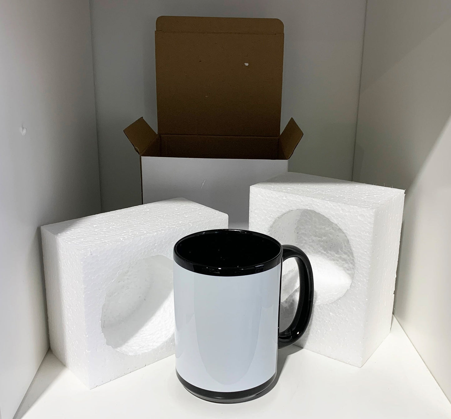 15 once black mugs with white strip with reinforced foam box packaging